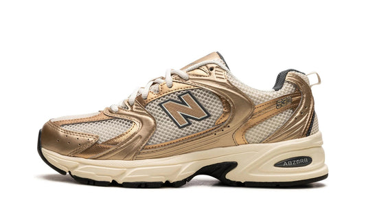 New Balance 530 Turtledove Gold Metallic Sneakers MR530LA