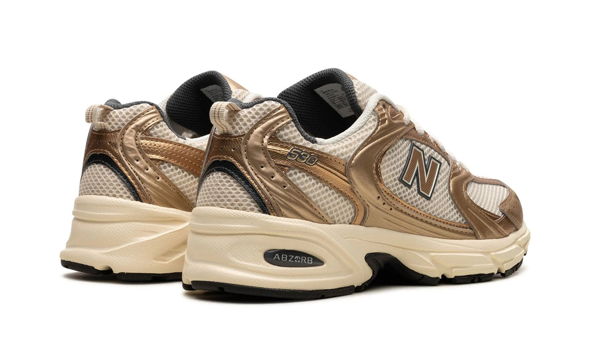 New Balance 530 Turtledove Gold Metallic Sneakers MR530LA