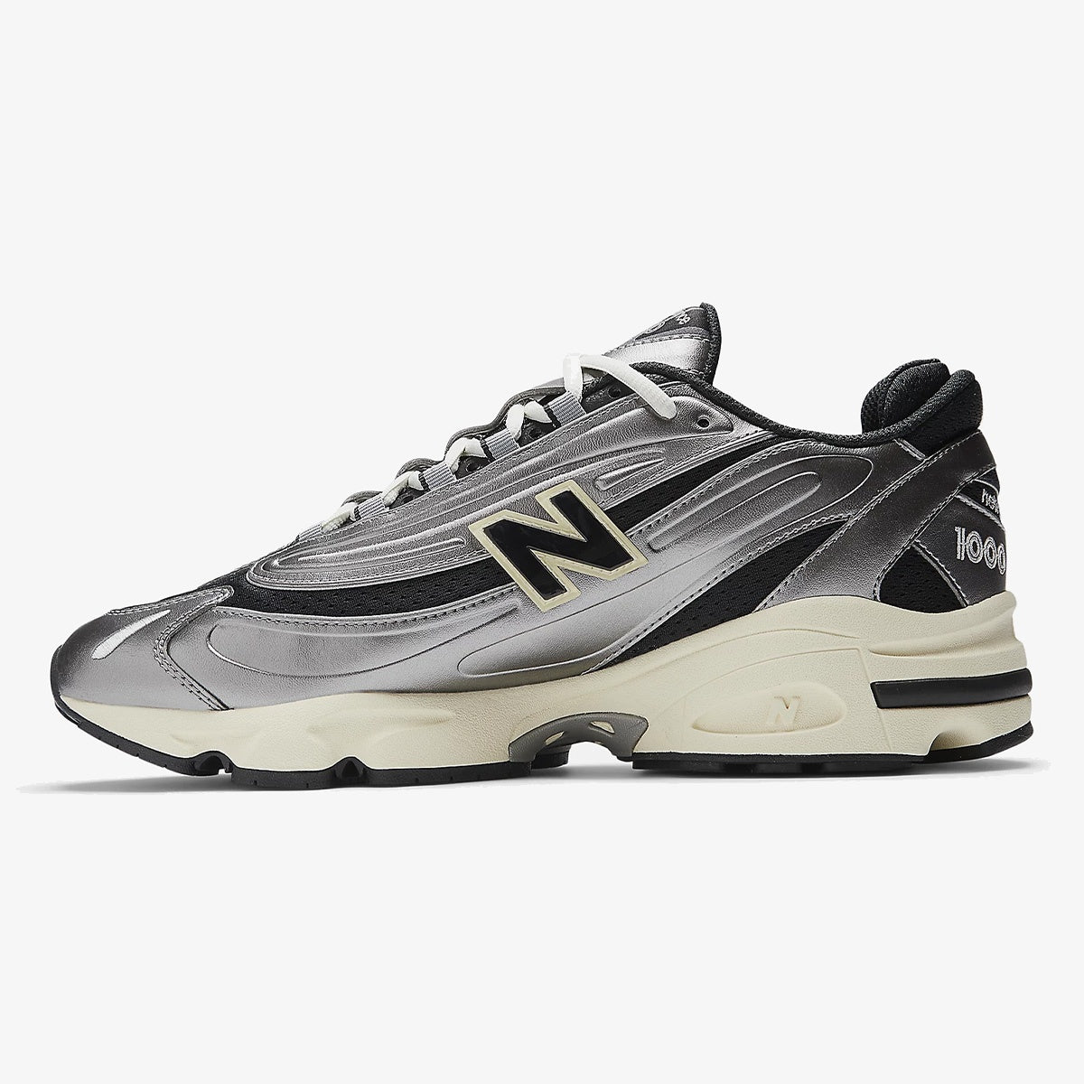 silver metallic - Silver metallic sneaker with black mesh, silver overlays, and cream midsole