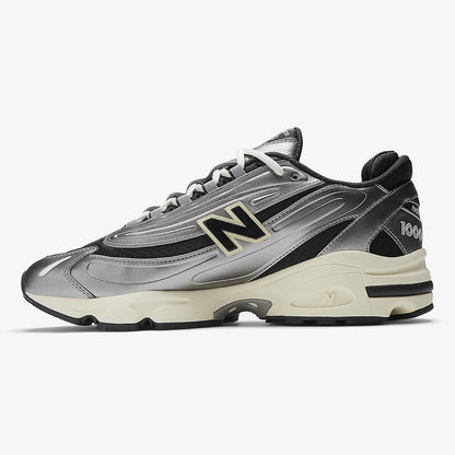 silver metallic - Silver metallic sneaker with black mesh, silver overlays, and cream midsole