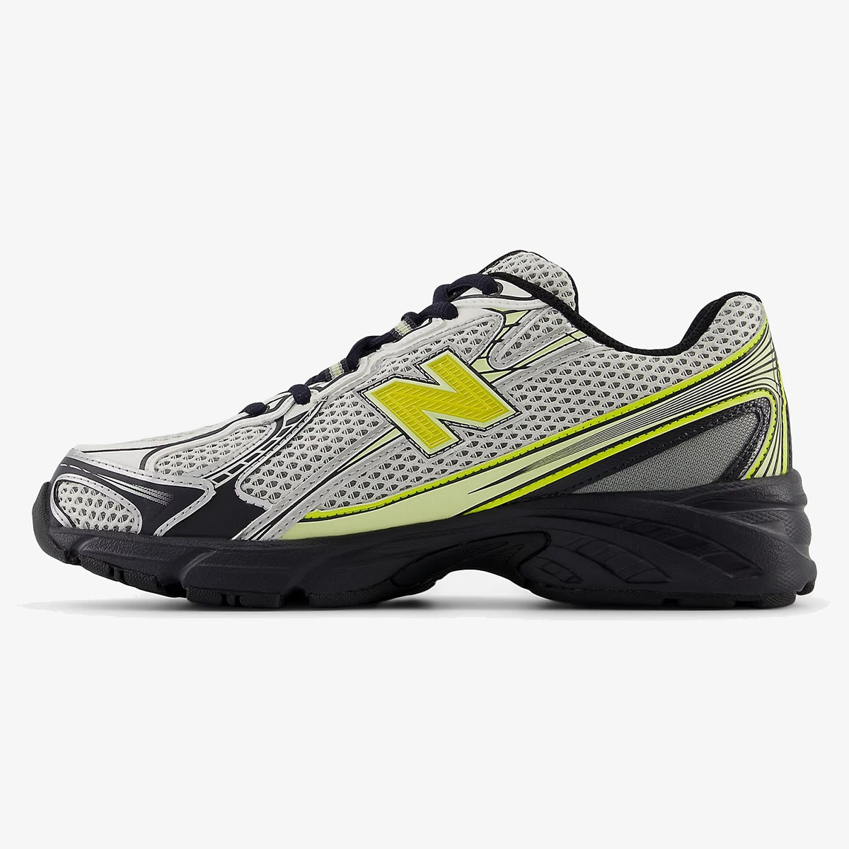 White, black, and yellow ARDELIXA sneaker with silver overlay details